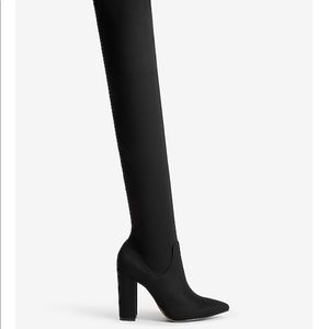 Knee high heeled boots. Size 7